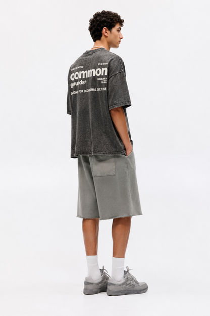 Black acid wash tee “Quality in Motion” by CG STUDIO